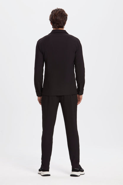 THE PLEATED TROUSERS
